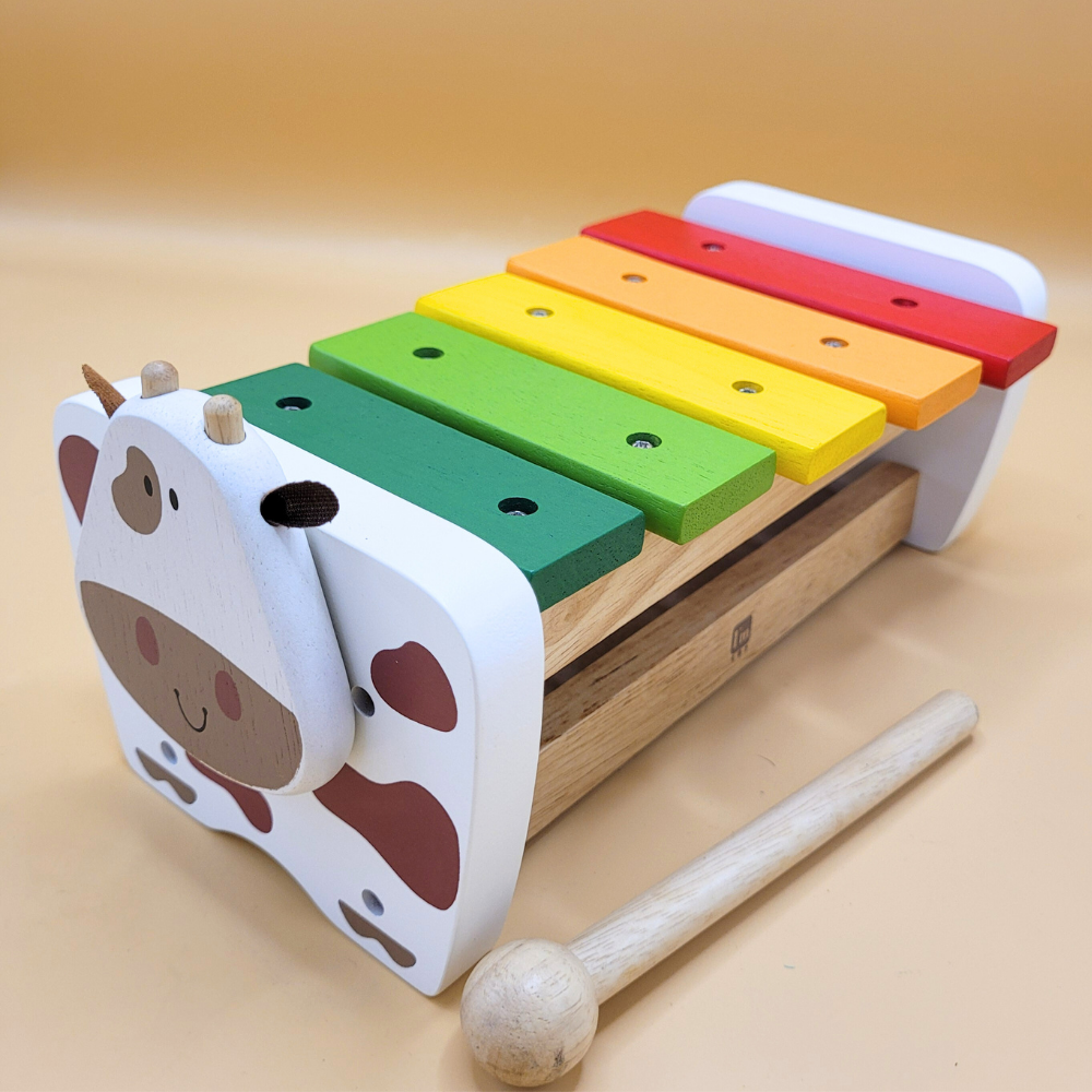 cow toy, xylophone toy, wooden toy, baby toy, toddler toy, musical toy, educational toy, developmental toy, eco-friendly toy, safe toy, durable toy, Montessori toy